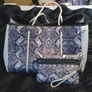 Haute Shore travel bag and pouch.  Snakeskin design